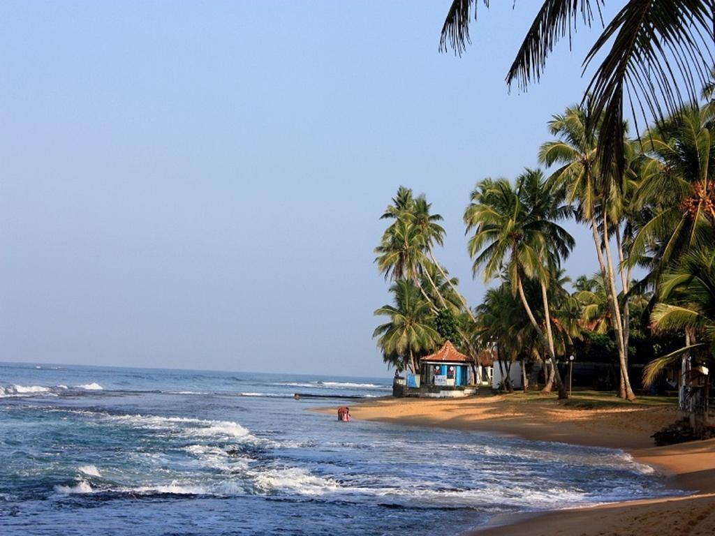 Time N Tide Beach Resort Hikkaduwa Bagian luar foto